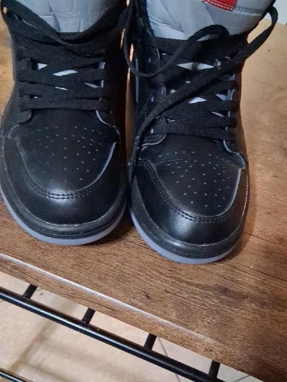 Jordan Black High-Top Sneakers with Red Tongue Patch